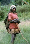 a lady dressed in the traditional bast skirt